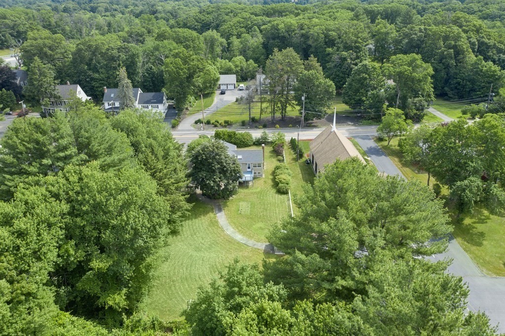 254 Edgell Road Framingham, MA 01701 - Photo 37 of 42 an aerial view of residential house with outdoor space and trees all around