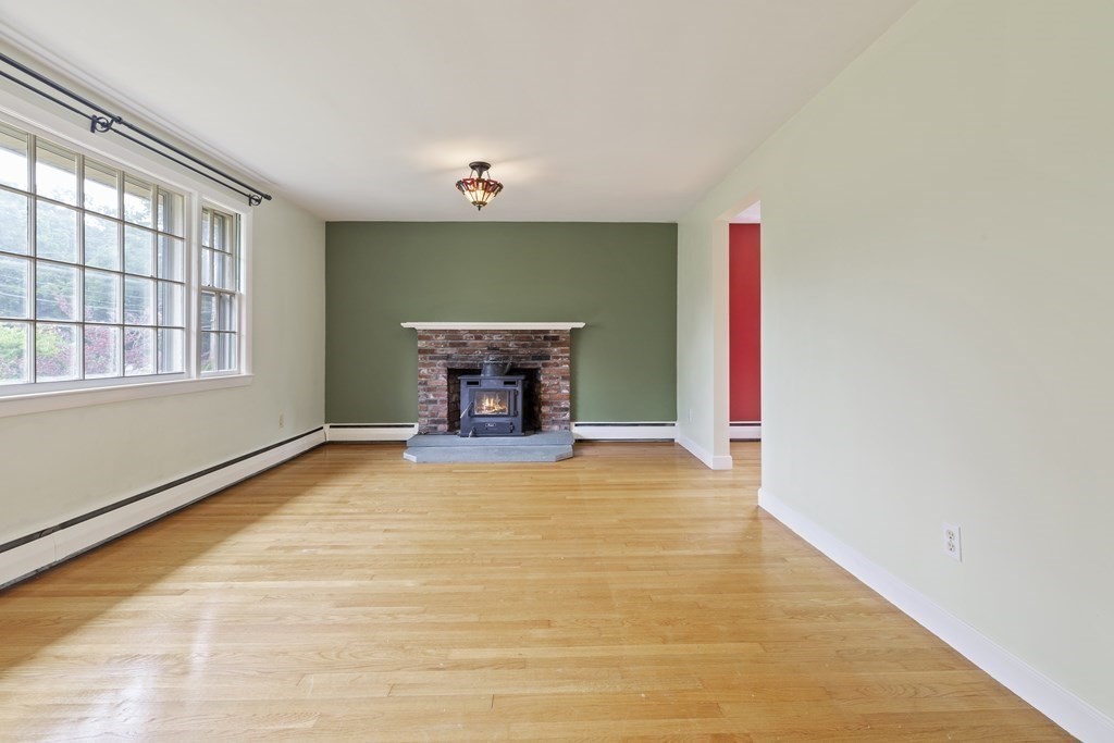 254 Edgell Road Framingham, MA 01701 - Photo 6 of 42 a view of an empty room with a window