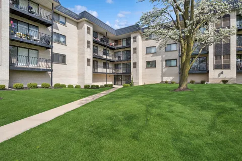 a view of building with yard