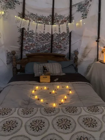a view of a yard covered with snow in front of house
