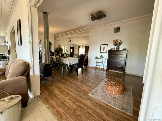 a living room with furniture and a table