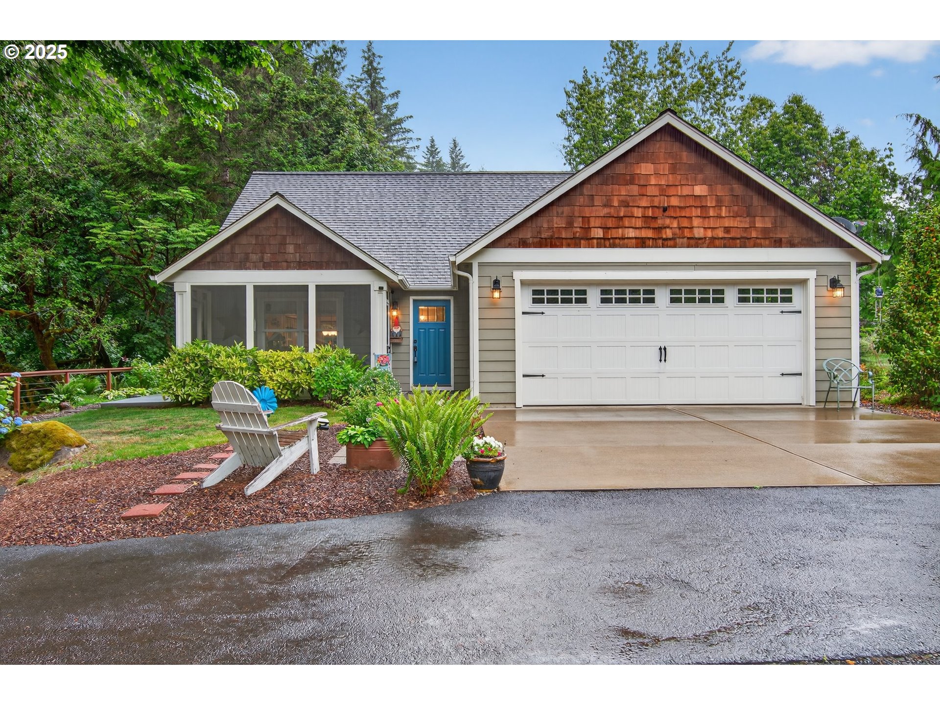 721 Abernathy Creek Road Longview, WA 98632 - Photo 1 of 40 a front view of a house with a yard and garage