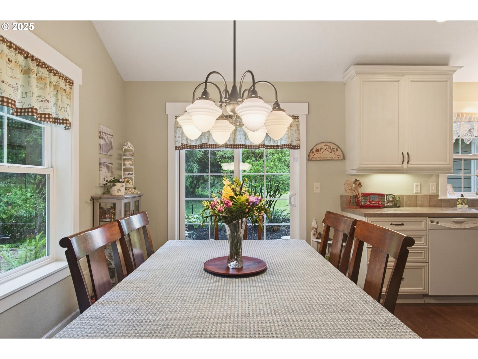 721 Abernathy Creek Road Longview, WA 98632 - Photo 19 of 40 a view of a dining room with furniture a livingroom and chandelier