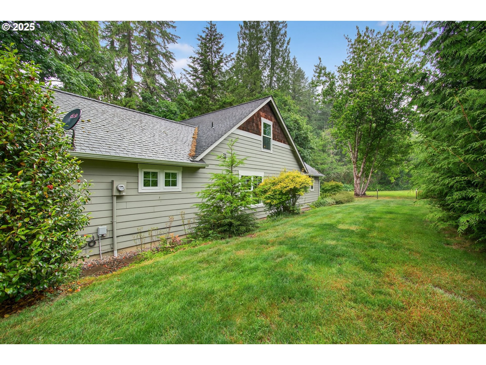 721 Abernathy Creek Road Longview, WA 98632 - Photo 36 of 40 a aerial view of a house next to a yard
