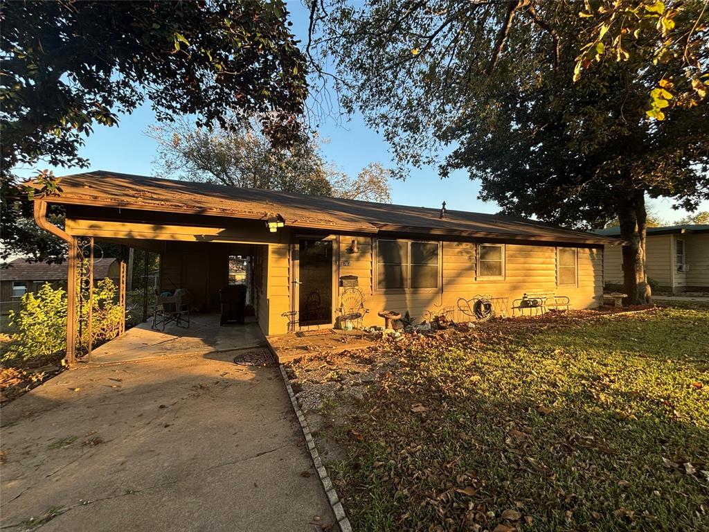 703 South 32nd Street Temple, TX 76501 - Photo 1 of 1 a front view of house with outdoor seating