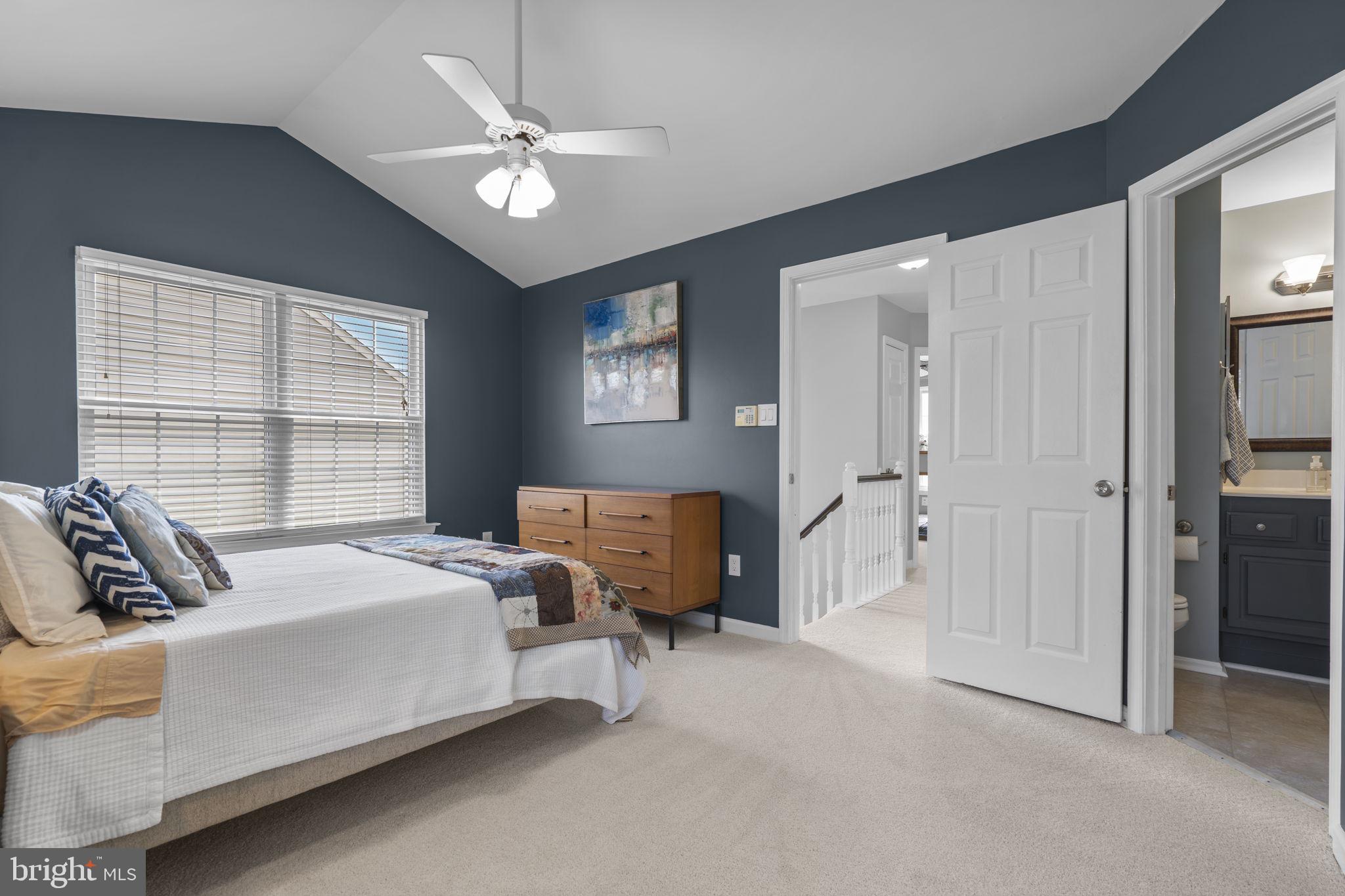 20250 Brookview Square Ashburn, VA 20147 - Photo 24 of 45 a bedroom with bed and window