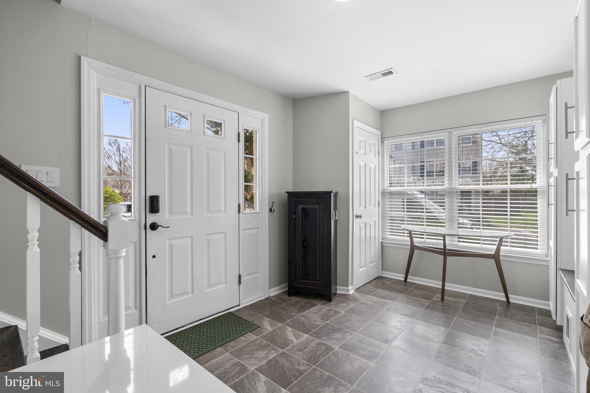 20250 Brookview Square Ashburn, VA 20147 - Photo 36 of 45 a view of a livingroom with furniture and staircase