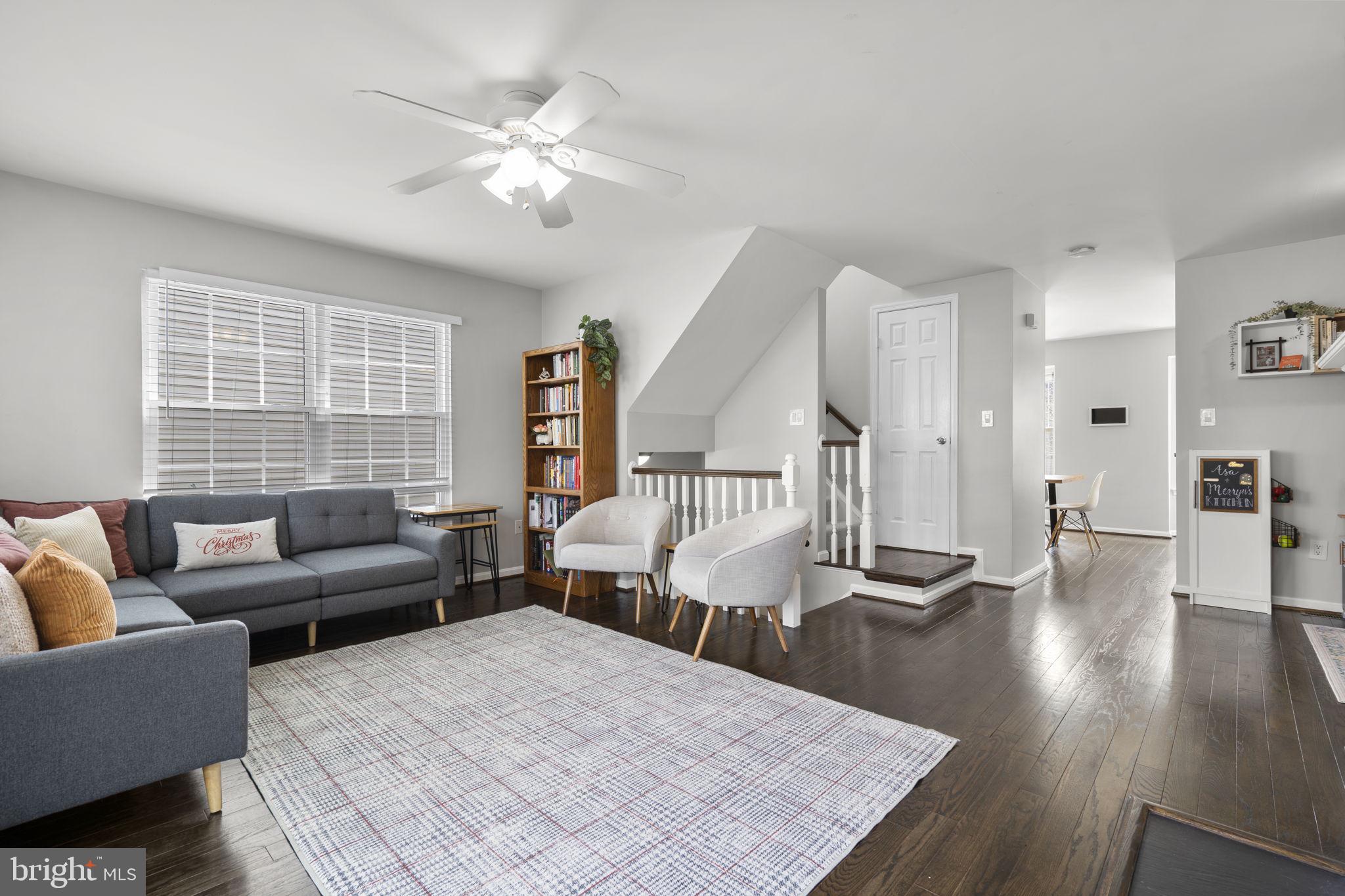 20250 Brookview Square Ashburn, VA 20147 - Photo 4 of 45 a living room with furniture and wooden floor