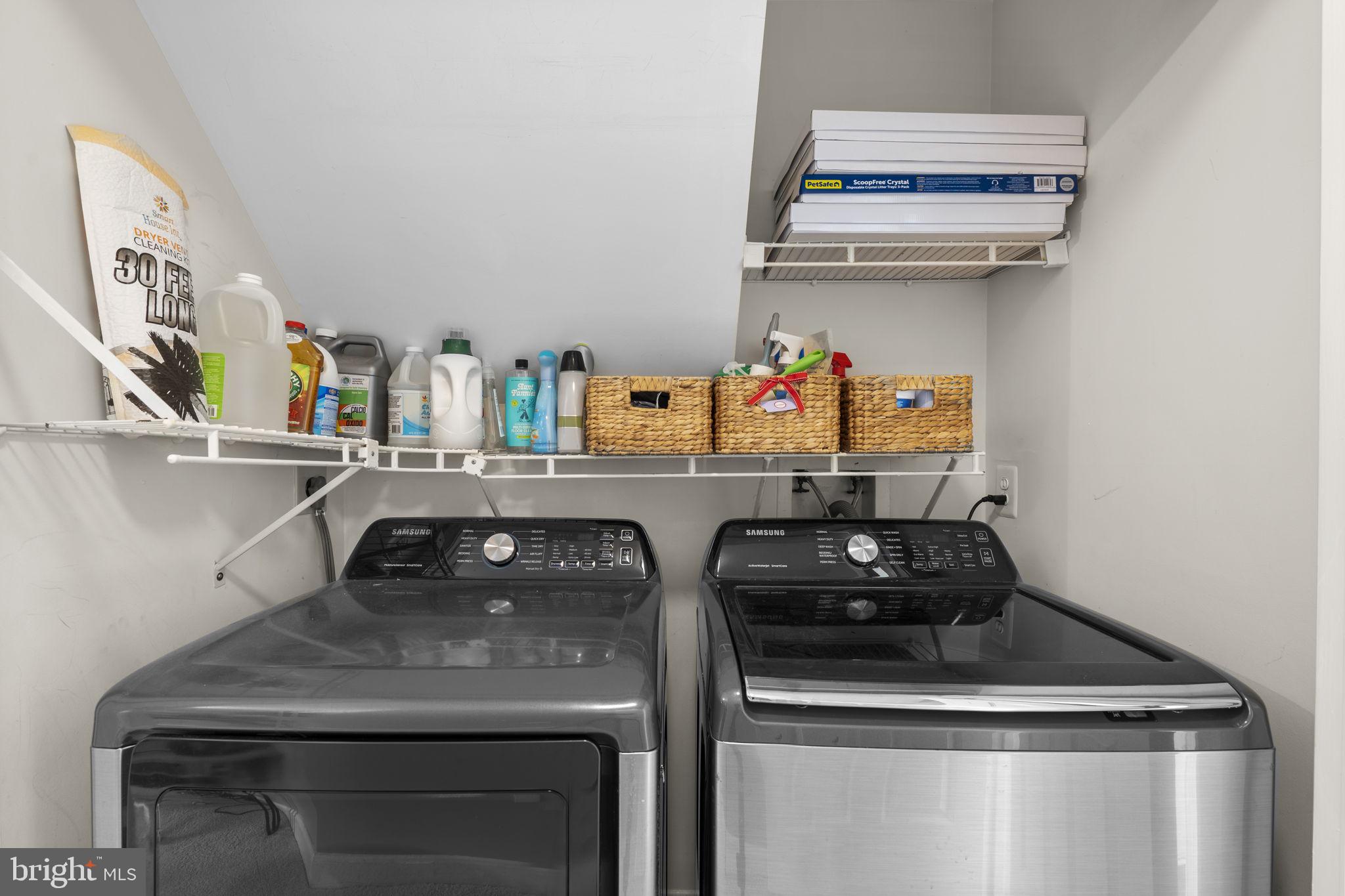 20250 Brookview Square Ashburn, VA 20147 - Photo 41 of 45 a kitchen with a sink a stove and cabinets