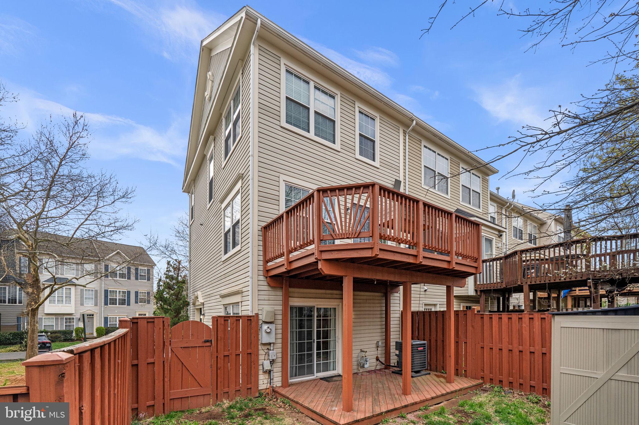 20250 Brookview Square Ashburn, VA 20147 - Photo 44 of 45 a front view of a house with a yard