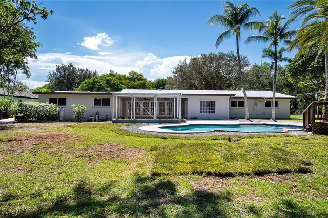 a view of a room with wooden walls