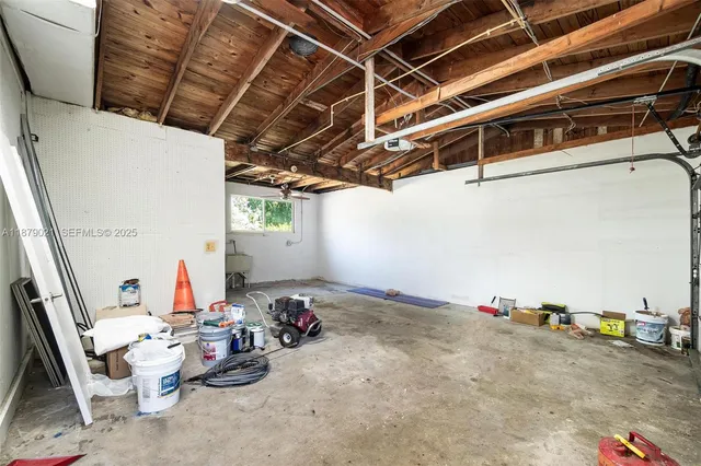 a backyard of a house with yard and outdoor seating