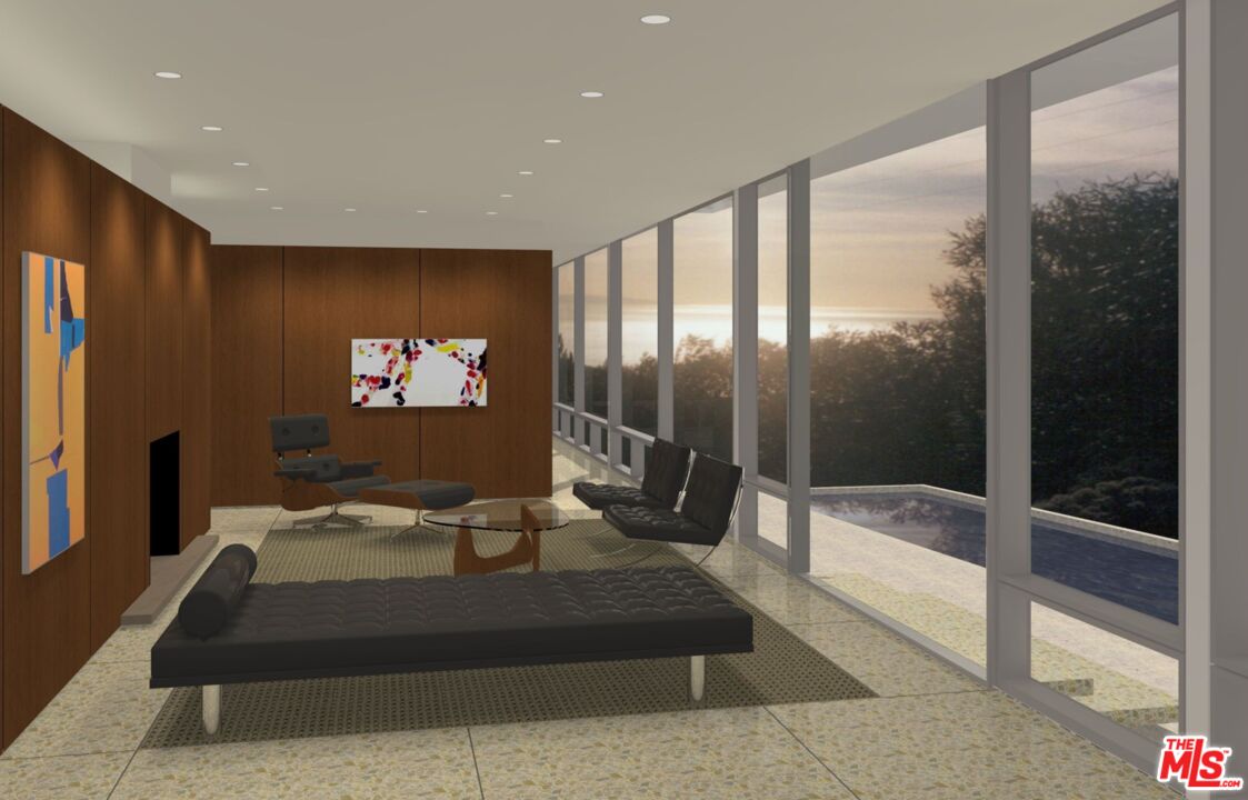 a living room with large couches and a flat screen tv