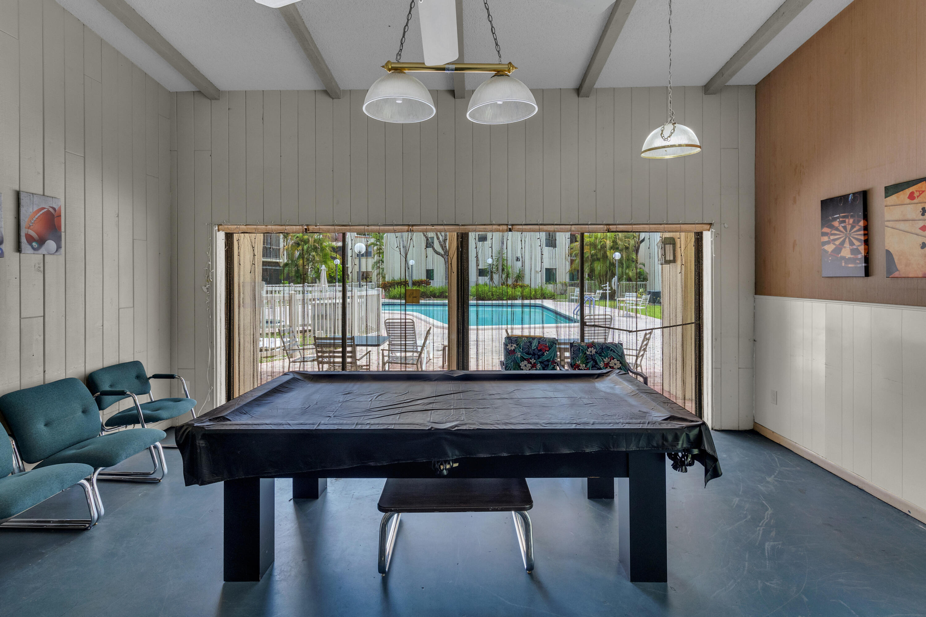 301 North Pine Island Road, Unit 101 Plantation, FL 33324 - Photo 27 of 51 a view of a dining table and chairs in a room