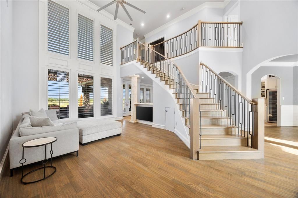 1572 Rabbit Rdg Road Heath, TX 75032 - Photo 14 of 36 a view of entryway and hall with wooden floor