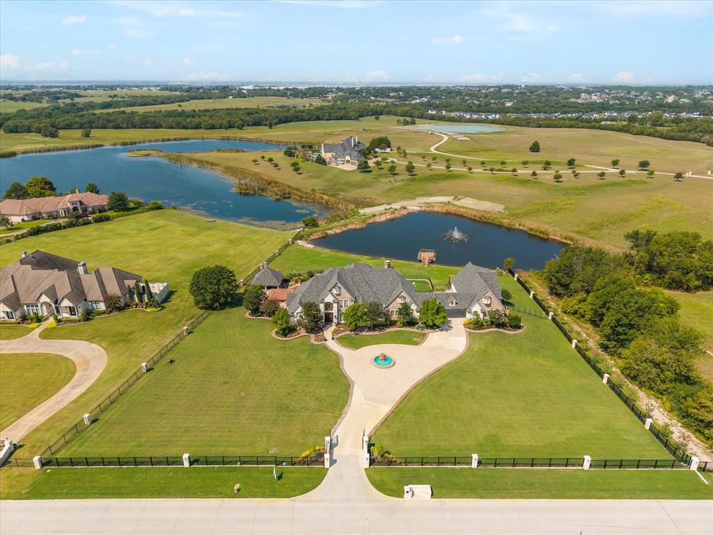1572 Rabbit Rdg Road Heath, TX 75032 - Photo 2 of 36 an aerial view of residential houses with outdoor space and ocean view