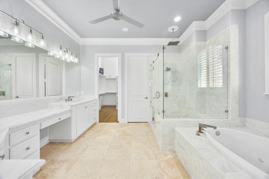 1572 Rabbit Rdg Road Heath, TX 75032 - Photo 21 of 36 a spacious bathroom with a tub sink shower and mirror