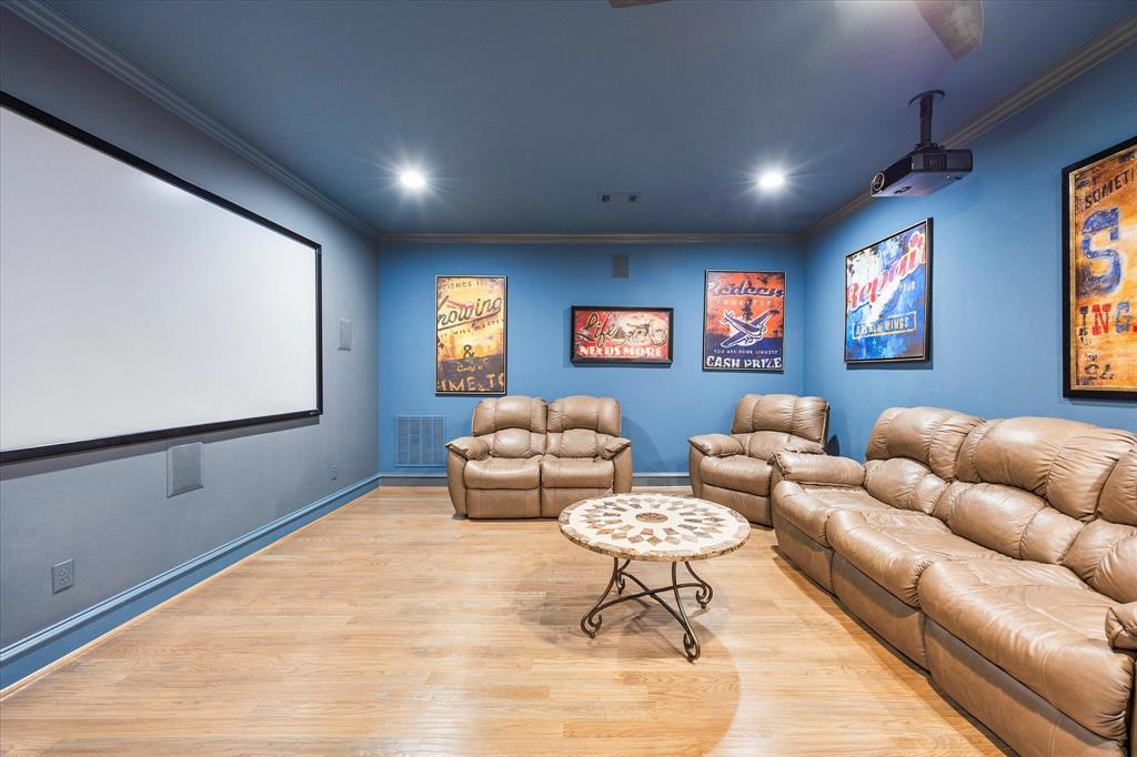 1572 Rabbit Rdg Road Heath, TX 75032 - Photo 23 of 36 a living room with furniture and a flat screen tv