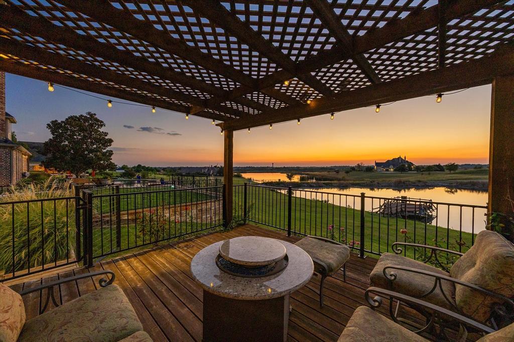 1572 Rabbit Rdg Road Heath, TX 75032 - Photo 30 of 36 a view of a balcony with lake view and a potted plant