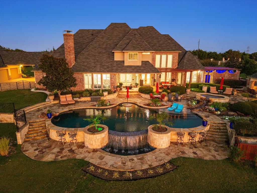 1572 Rabbit Rdg Road Heath, TX 75032 - Photo 32 of 36 a view of a swimming pool with a patio
