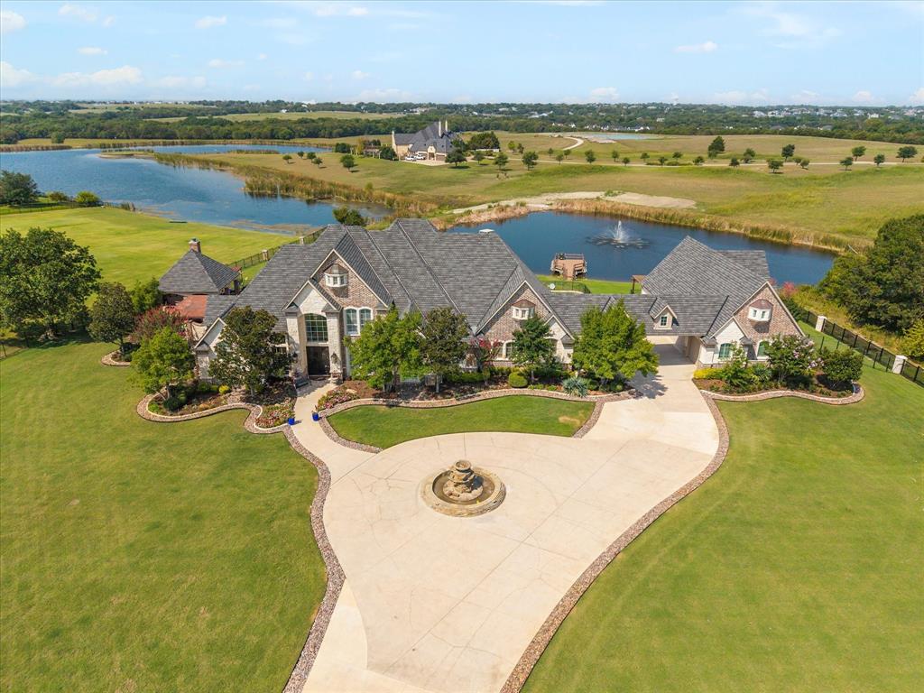 1572 Rabbit Rdg Road Heath, TX 75032 - Photo 4 of 36 a view of a house with a ocean view