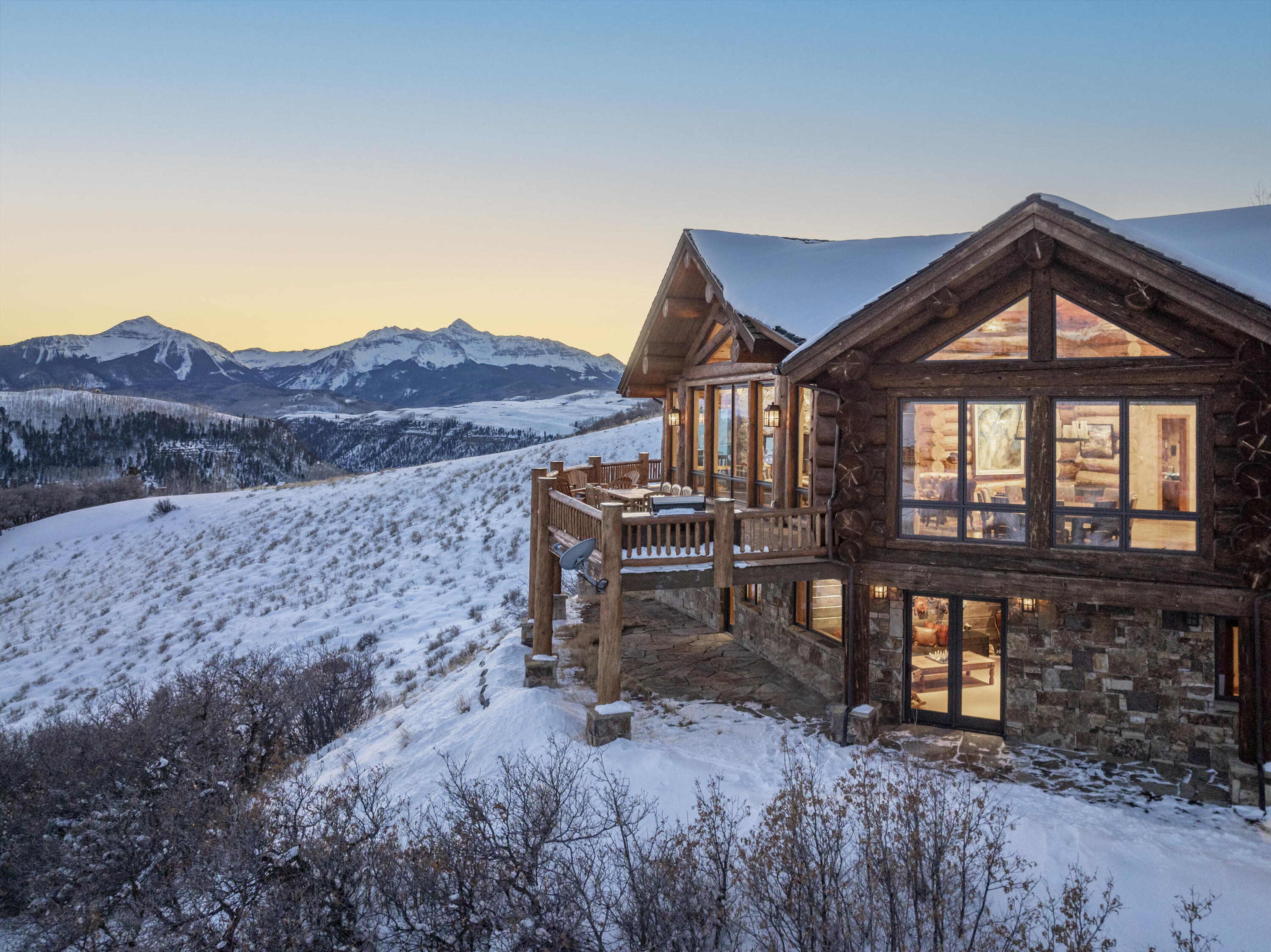 213 Josefa Lane Telluride, CO 81435 - Photo 33 of 35 a front view of a house with mountain view and a garden