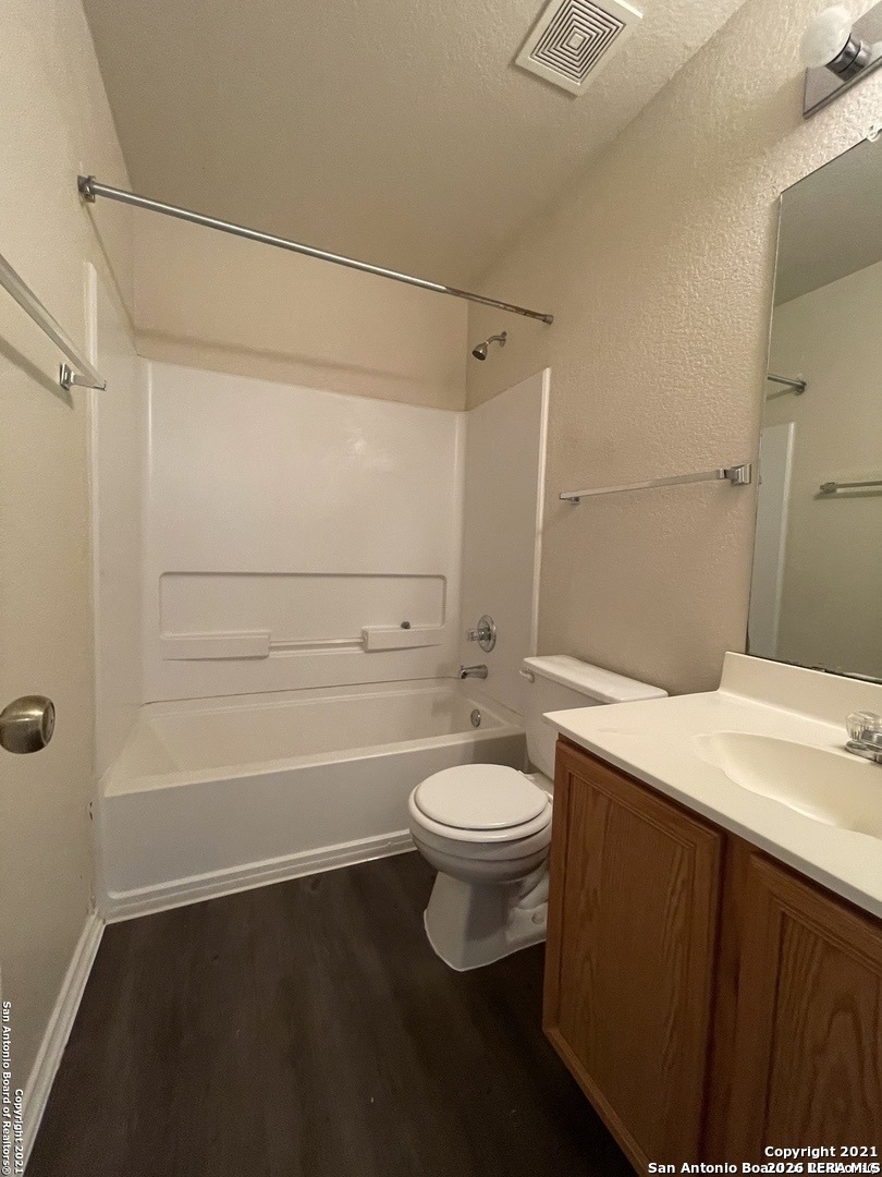 8927 Nature Trail Converse, TX 78109 - Photo 11 of 15 a bathroom with a sink a toilet and shower
