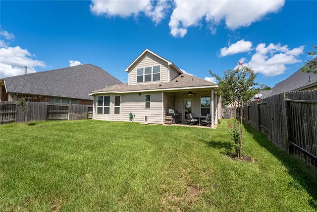 a view of a yard in front of house