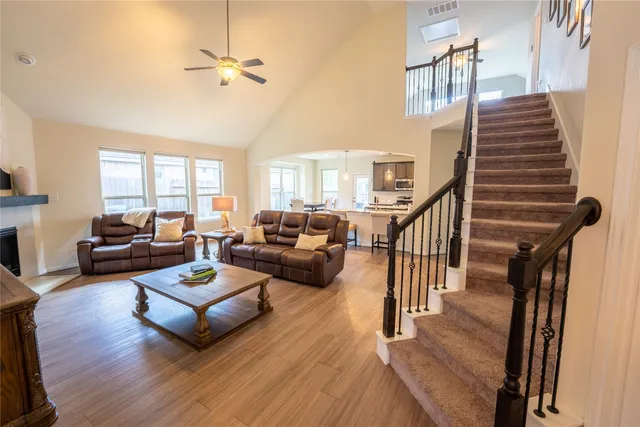 a living room with furniture or fireplace and a wooden floor
