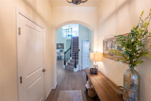 a view of entryway with wooden floor