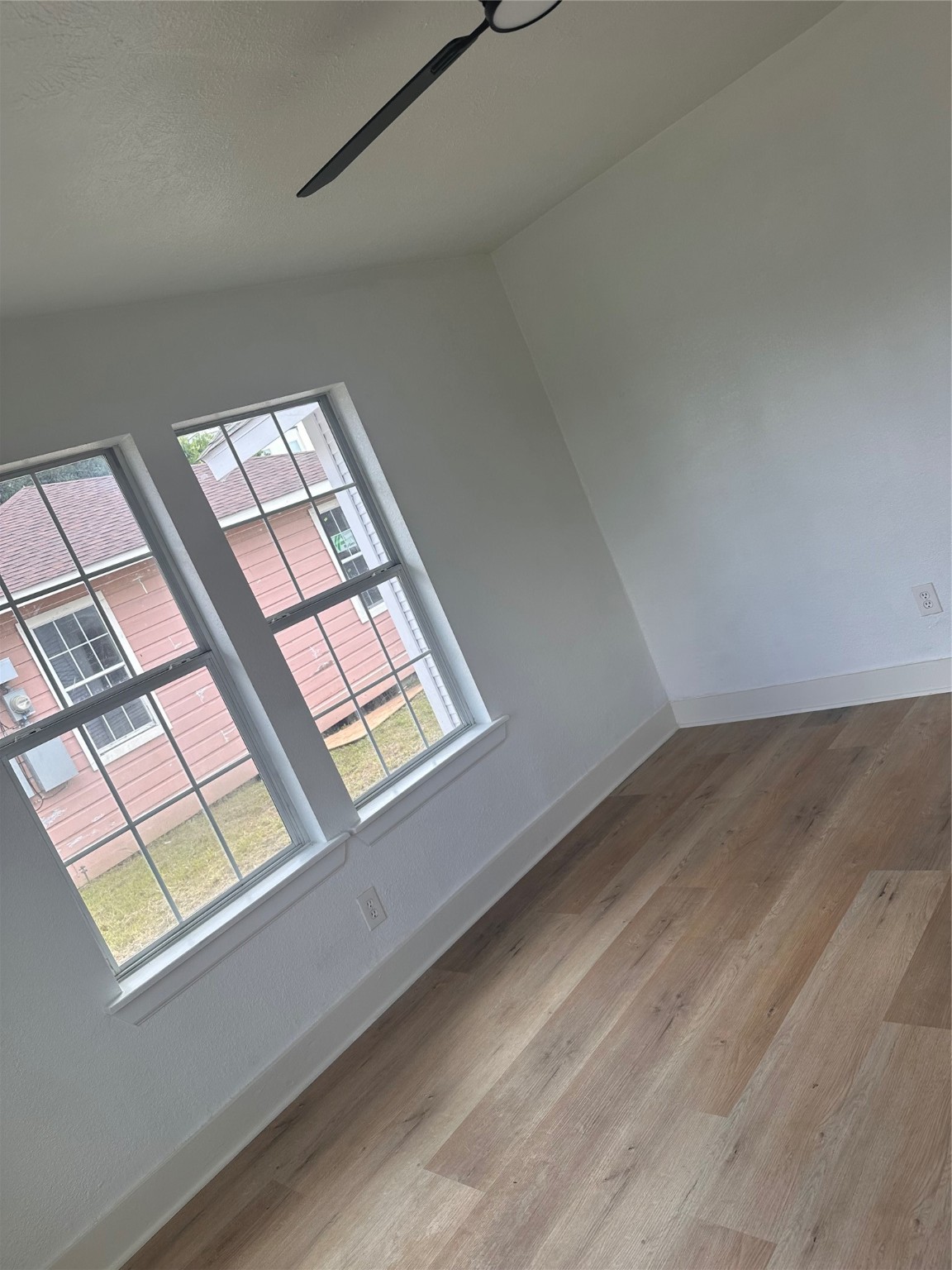 1704 Sam Wilson Street, Unit 7 Houston, TX 77020 - Photo 3 of 10 a view of an empty room and a window