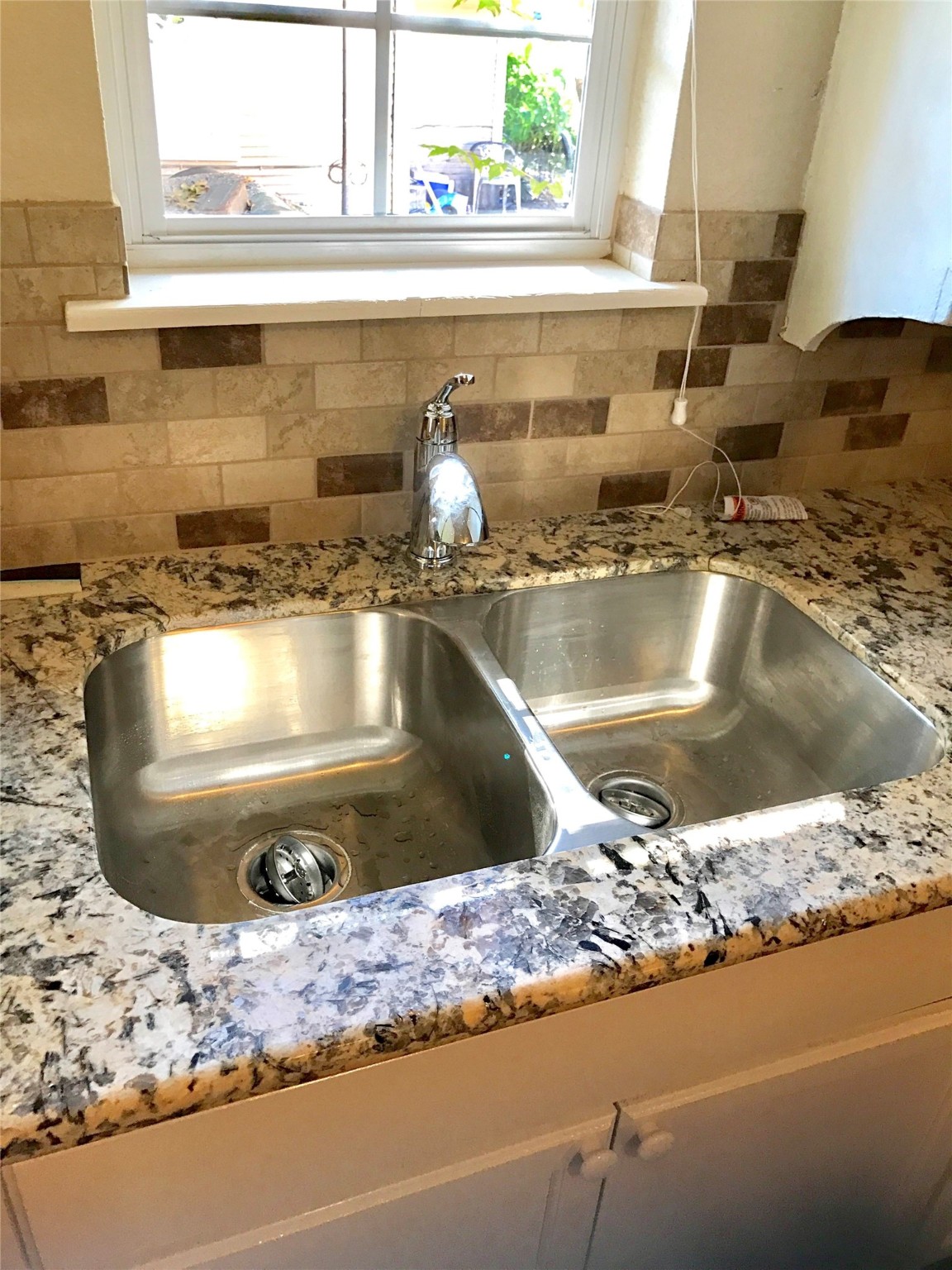 1704 Sam Wilson Street, Unit 7 Houston, TX 77020 - Photo 4 of 10 a view closed kitchen countertops and a stove