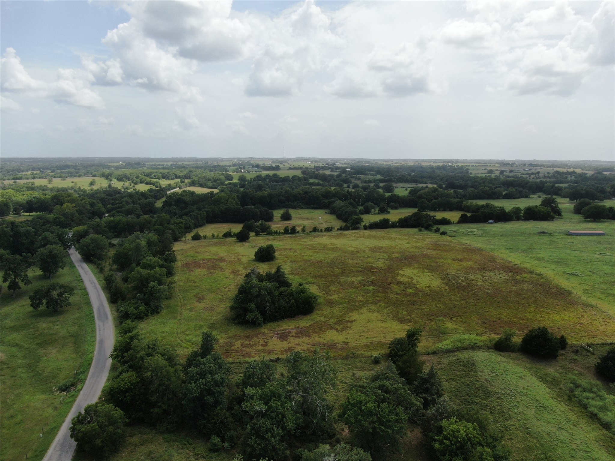 1399 Star Hill Road New Ulm, TX 78950 - Photo 2 of 42 a view of a houses with outdoor space