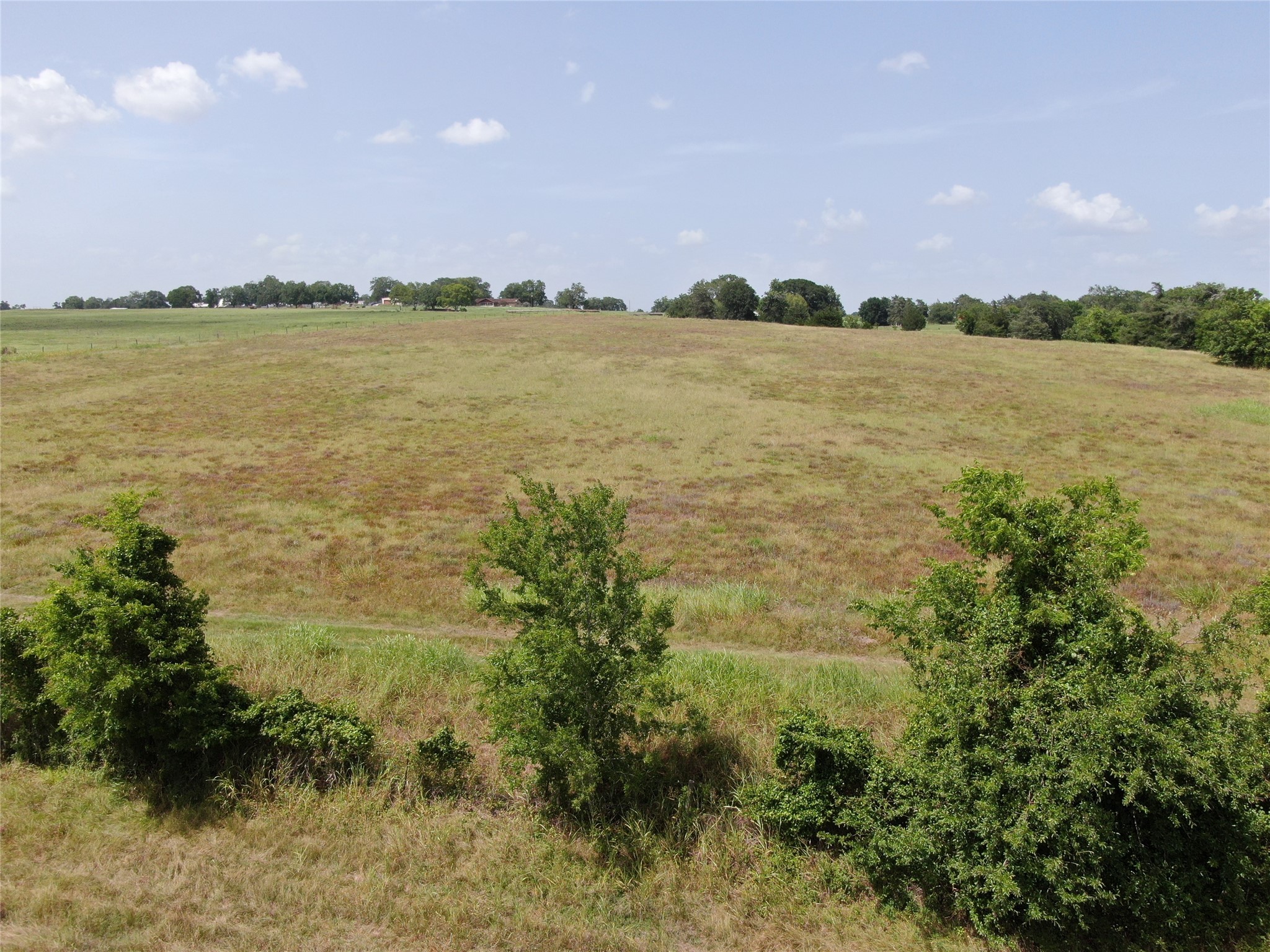 1399 Star Hill Road New Ulm, TX 78950 - Photo 22 of 42 a view of an ocean beach and a mountain view