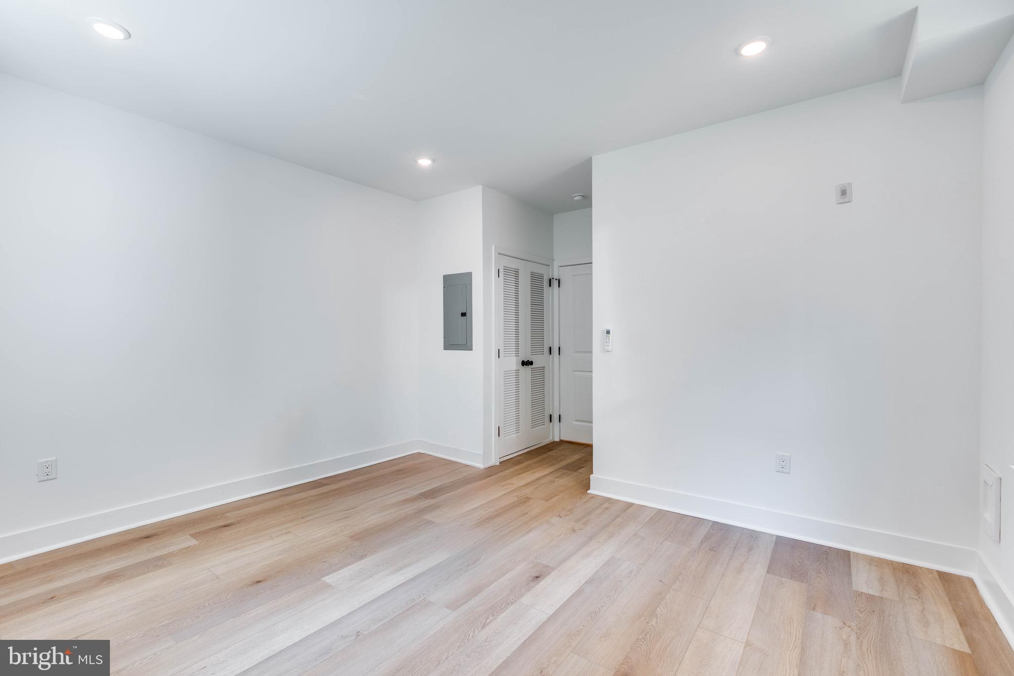 4220 Baltimore Avenue, Unit 2 Philadelphia, PA 19104 - Photo 6 of 11 an empty room with wooden floor
