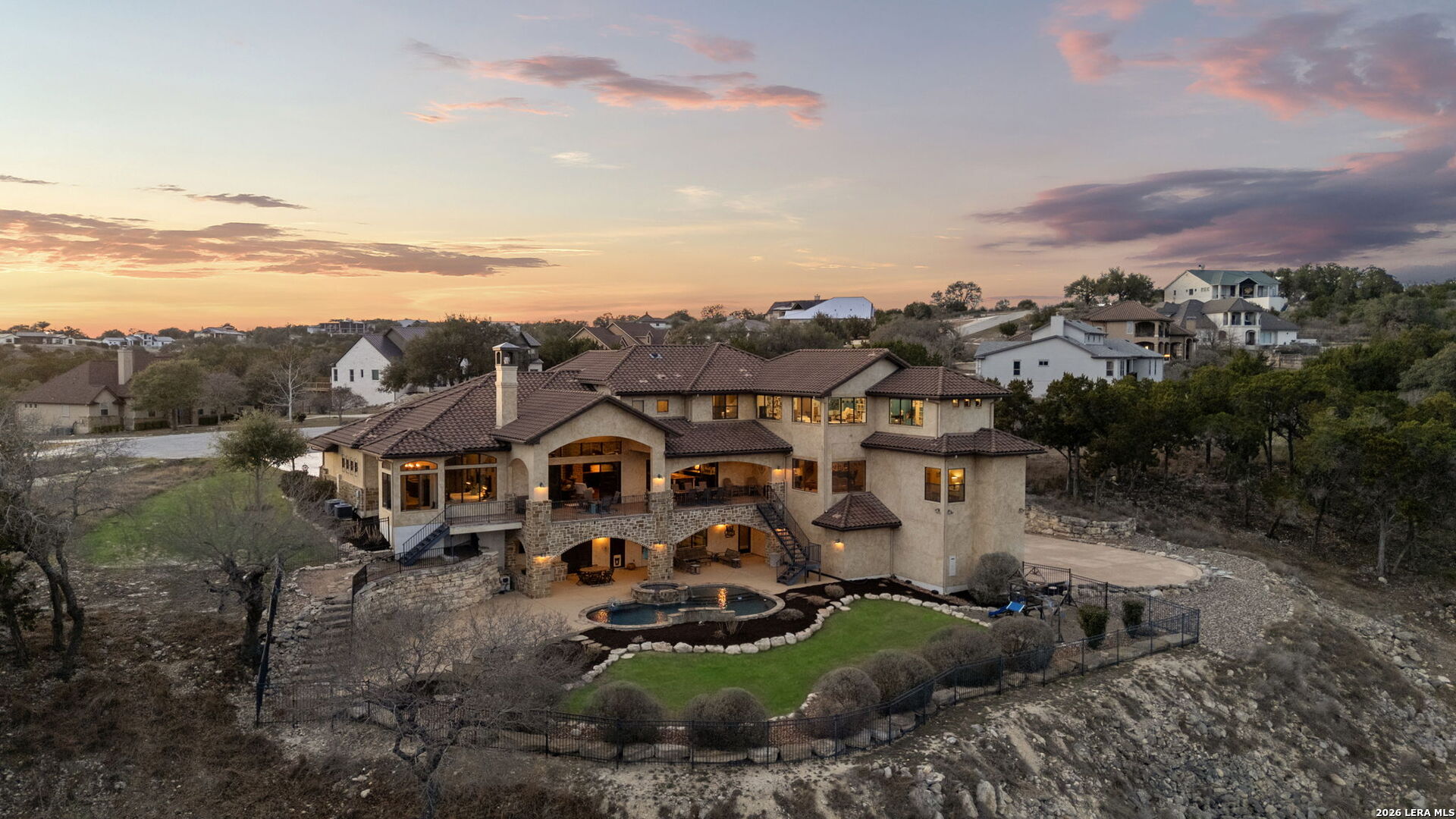 an aerial view of a house with a garden