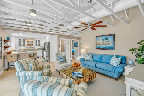 a view of swimming pool with sitting area