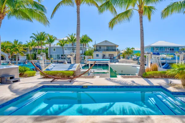 a view of a balcony with furniture