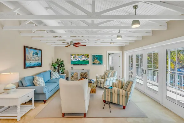 a kitchen with a stove a refrigerator and a sink