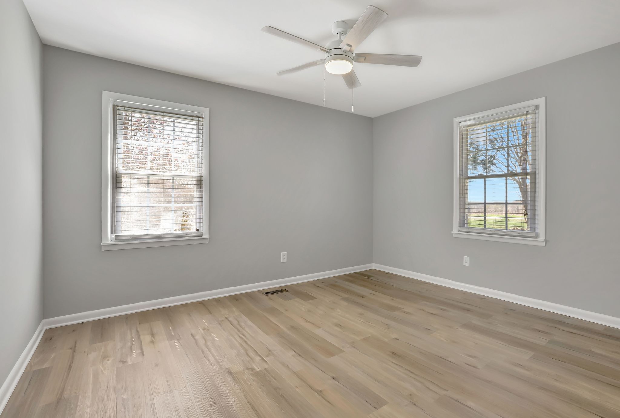 1481 Maxwell Road Belvidere, TN 37306 - Photo 29 of 45 a view of empty room with wooden floor and fan