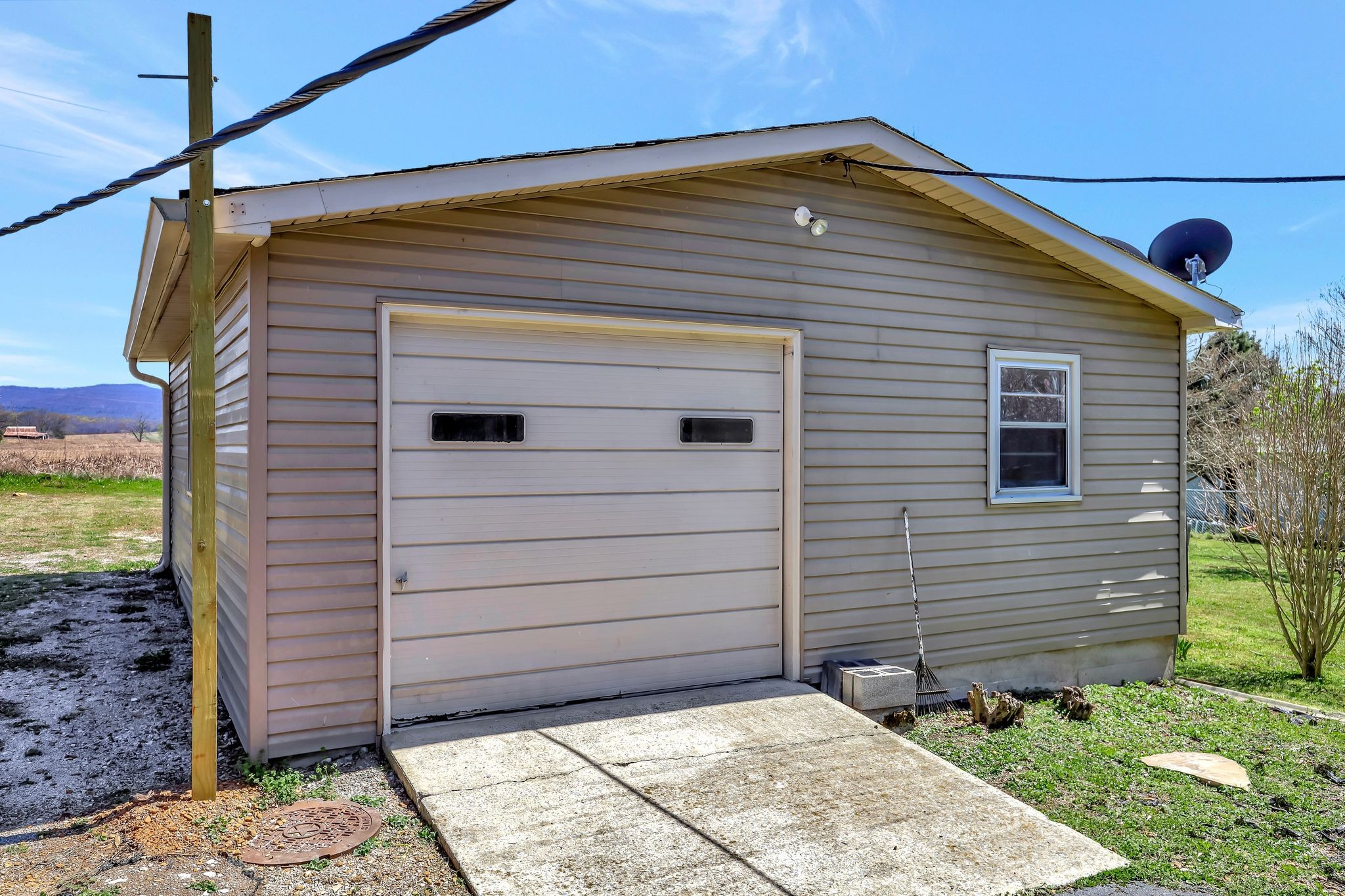 1481 Maxwell Road Belvidere, TN 37306 - Photo 34 of 45 a front view of a house with a yard