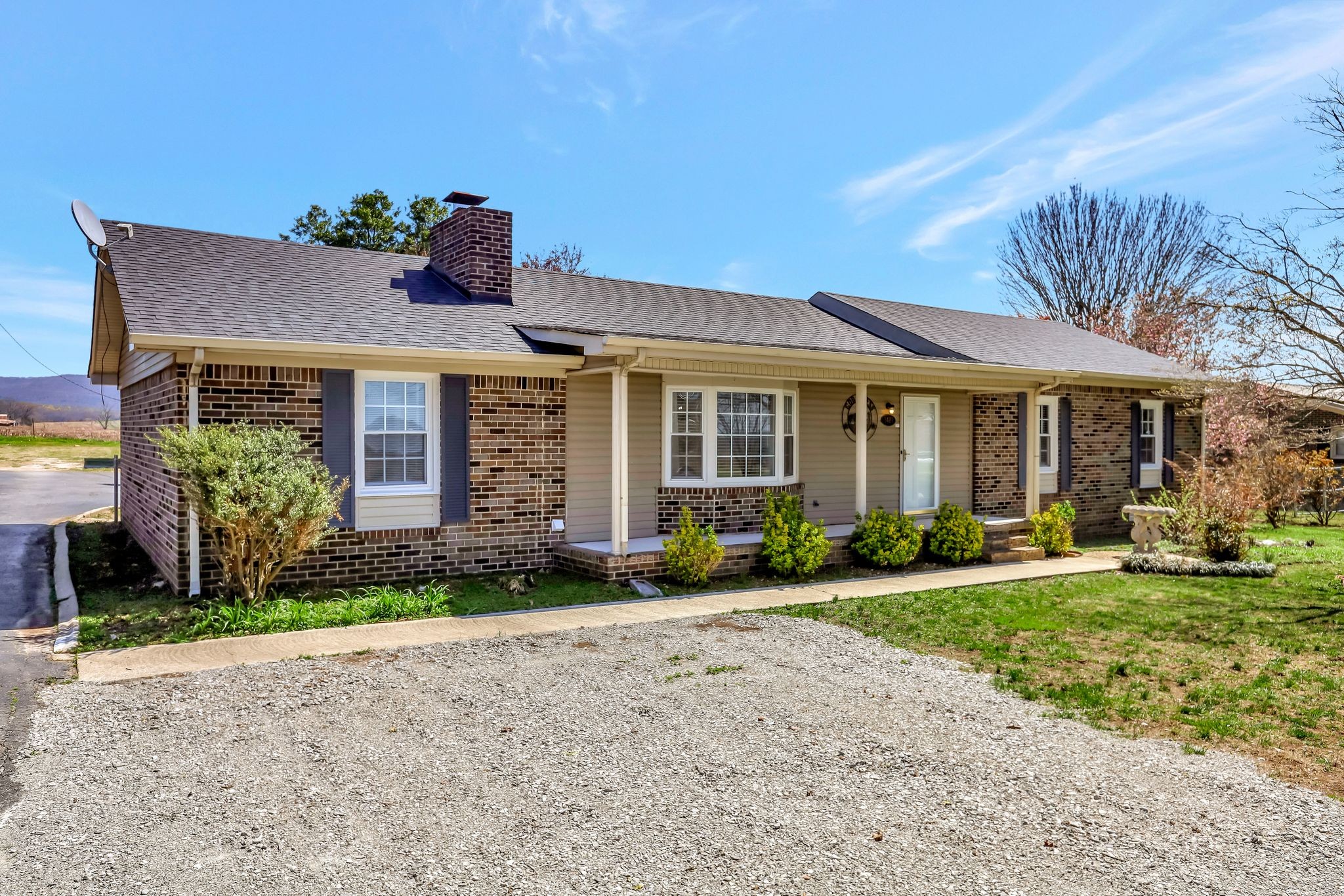 1481 Maxwell Road Belvidere, TN 37306 - Photo 7 of 45 a front view of a house with a yard
