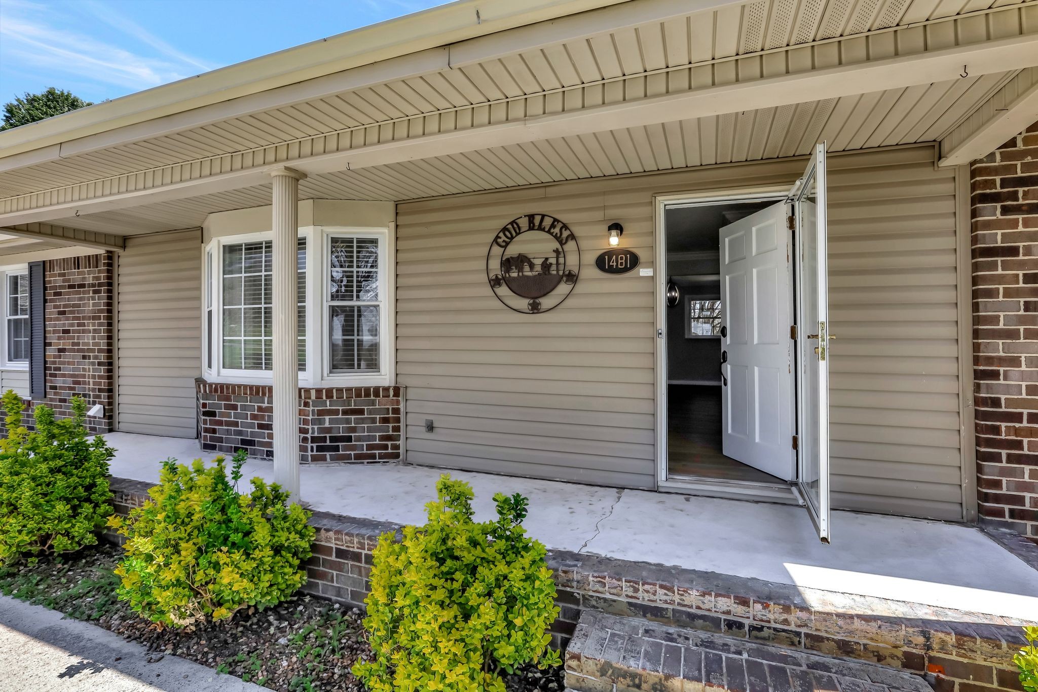 1481 Maxwell Road Belvidere, TN 37306 - Photo 10 of 45 a front view of a house with garden