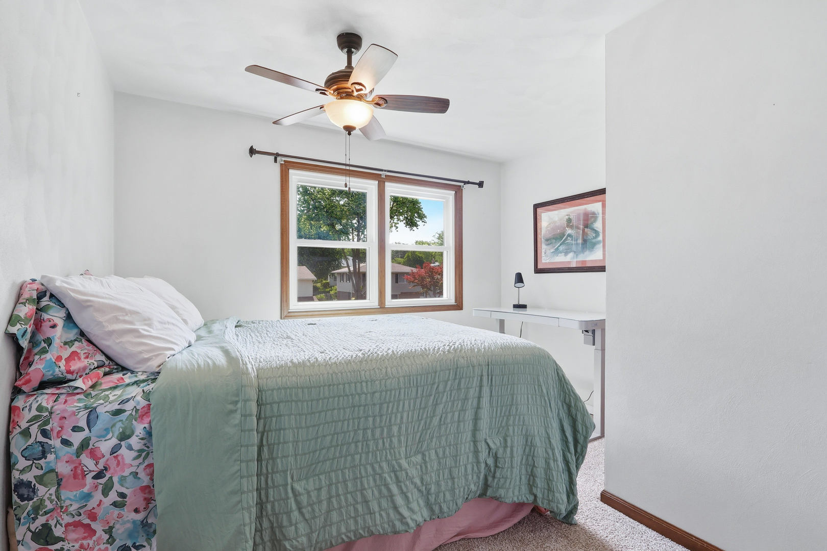 4314 Spring Street Davenport, IA 52807 - Photo 37 of 51 a bedroom with a bed and a window