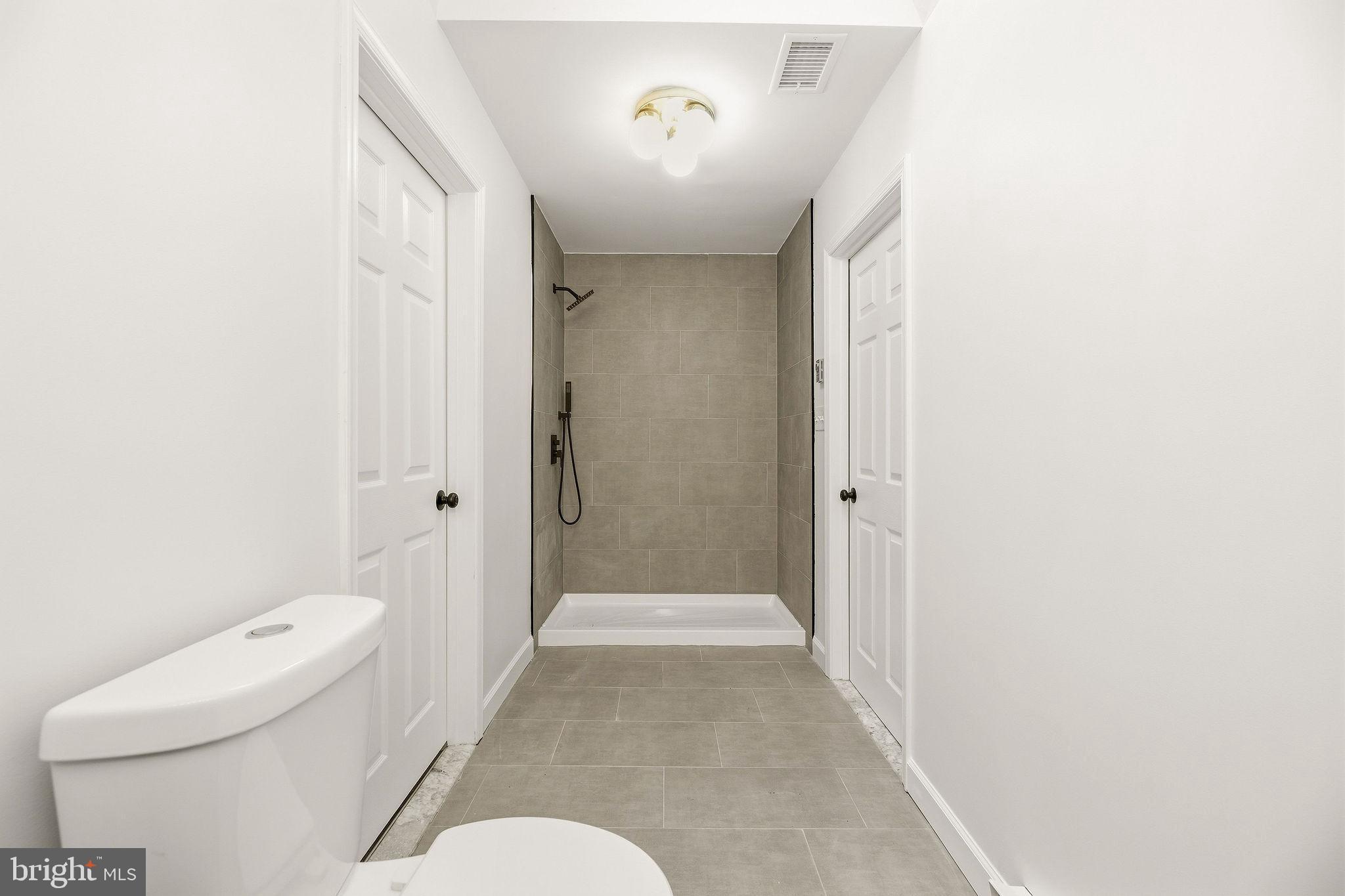 6664 Old Solomons Island Road Friendship, MD 20758 - Photo 19 of 39 Walk in shower updated