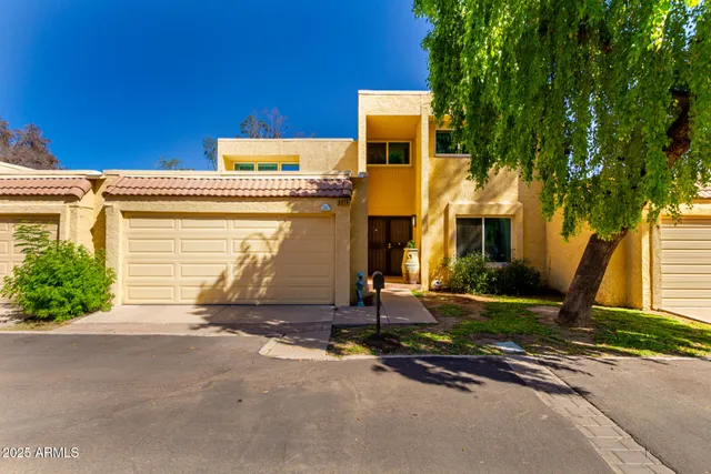front view of a house with a street