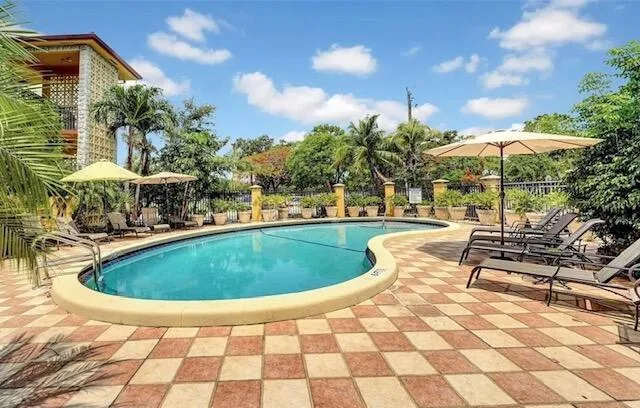 a view of a house with wooden floor and stairs
