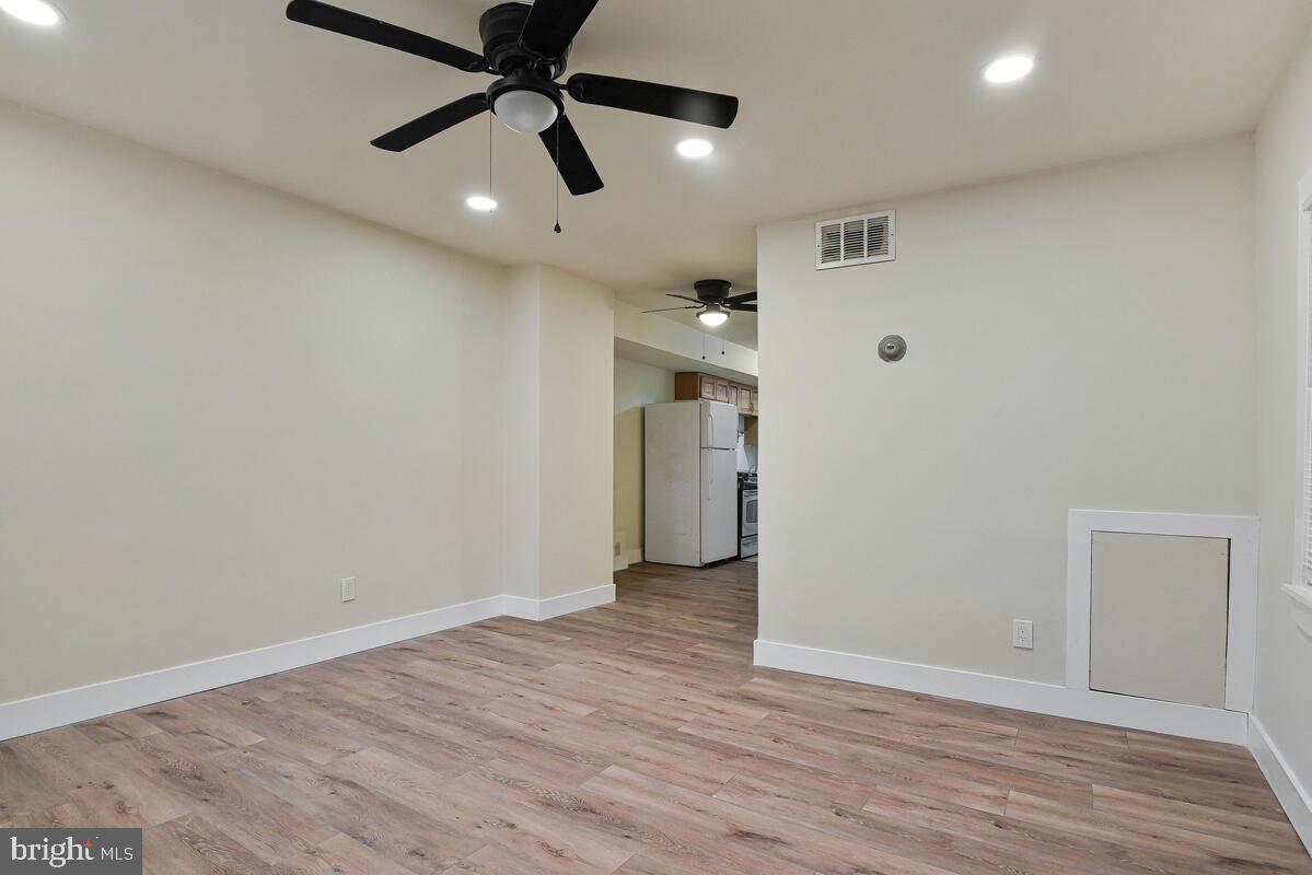3427 B Street Southeast, Unit 2 Washington, DC 20019 - Photo 4 of 14 wooden floor in an empty room