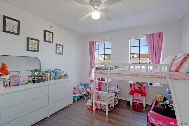 a living room with furniture and window