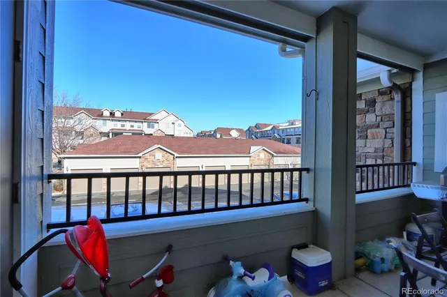 a view of a porch with furniture